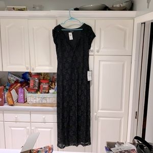 Mother of the bride dress or evening gown .